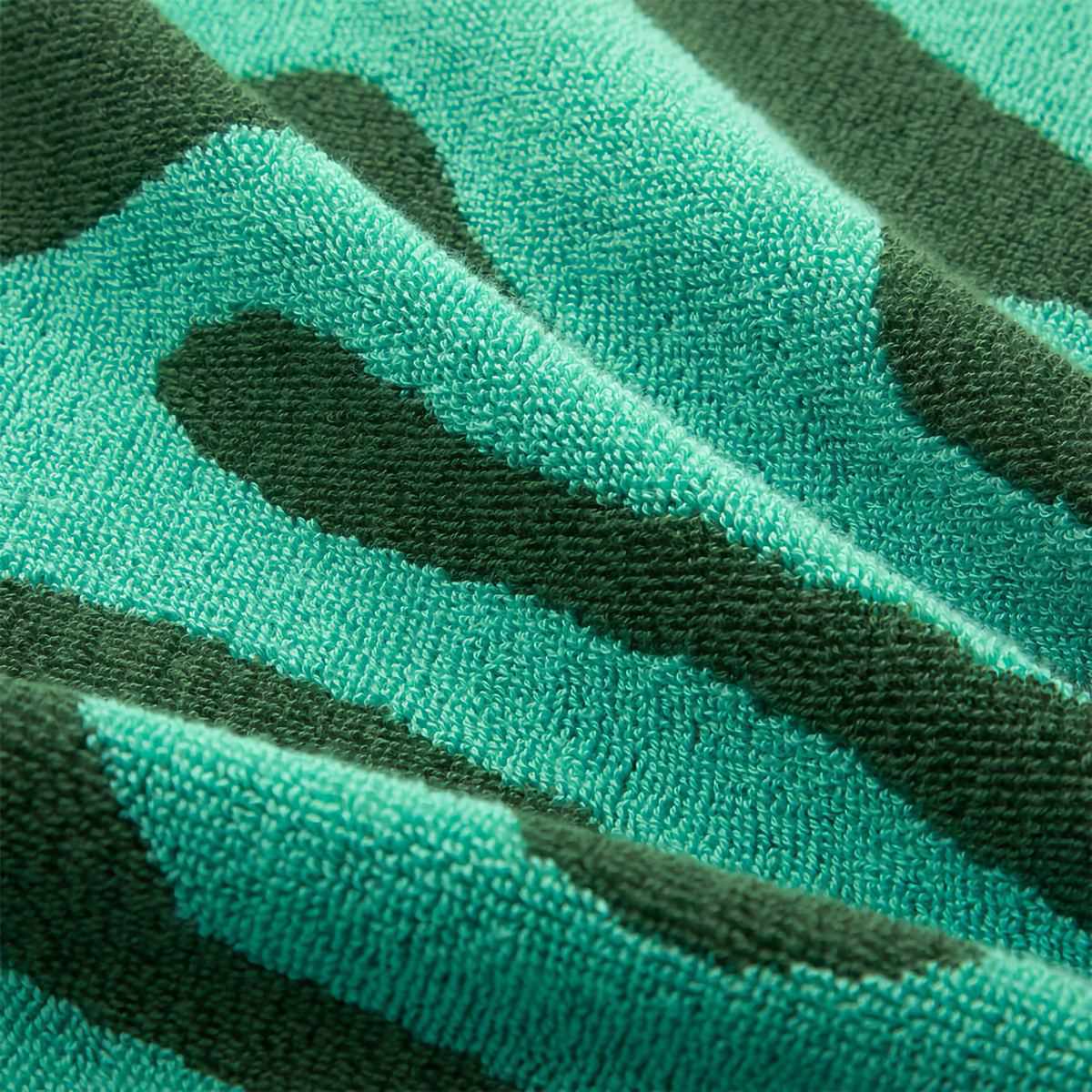Fabric Closeup of Yves Delorme Pampa Beach Towels in Menthe