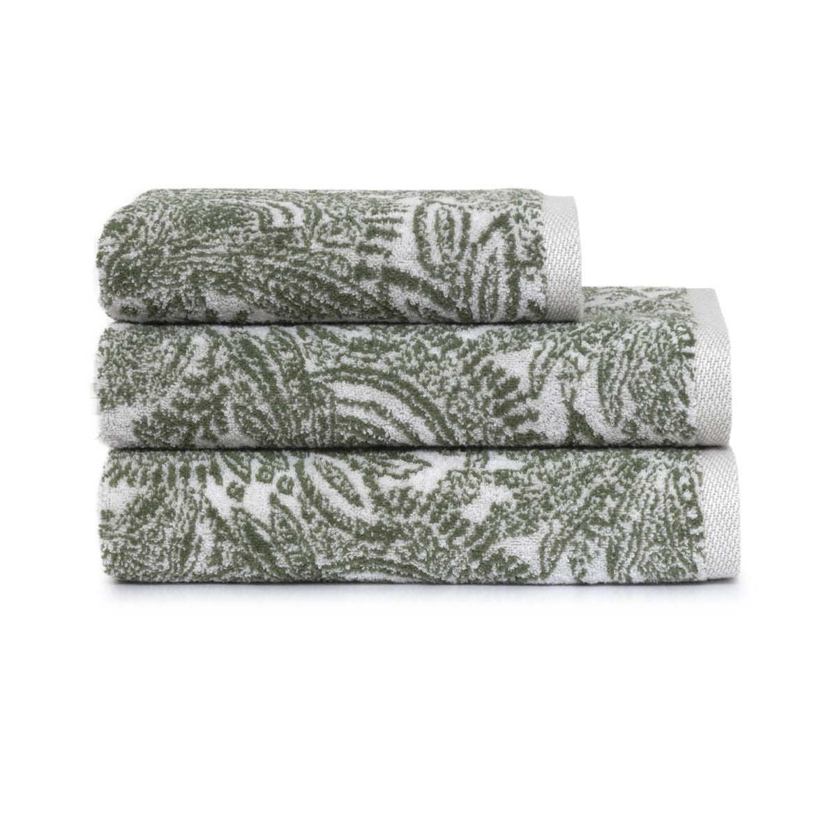 Three Yves Delorme Patio Bath towels are neatly stacked on top of each other against a white background