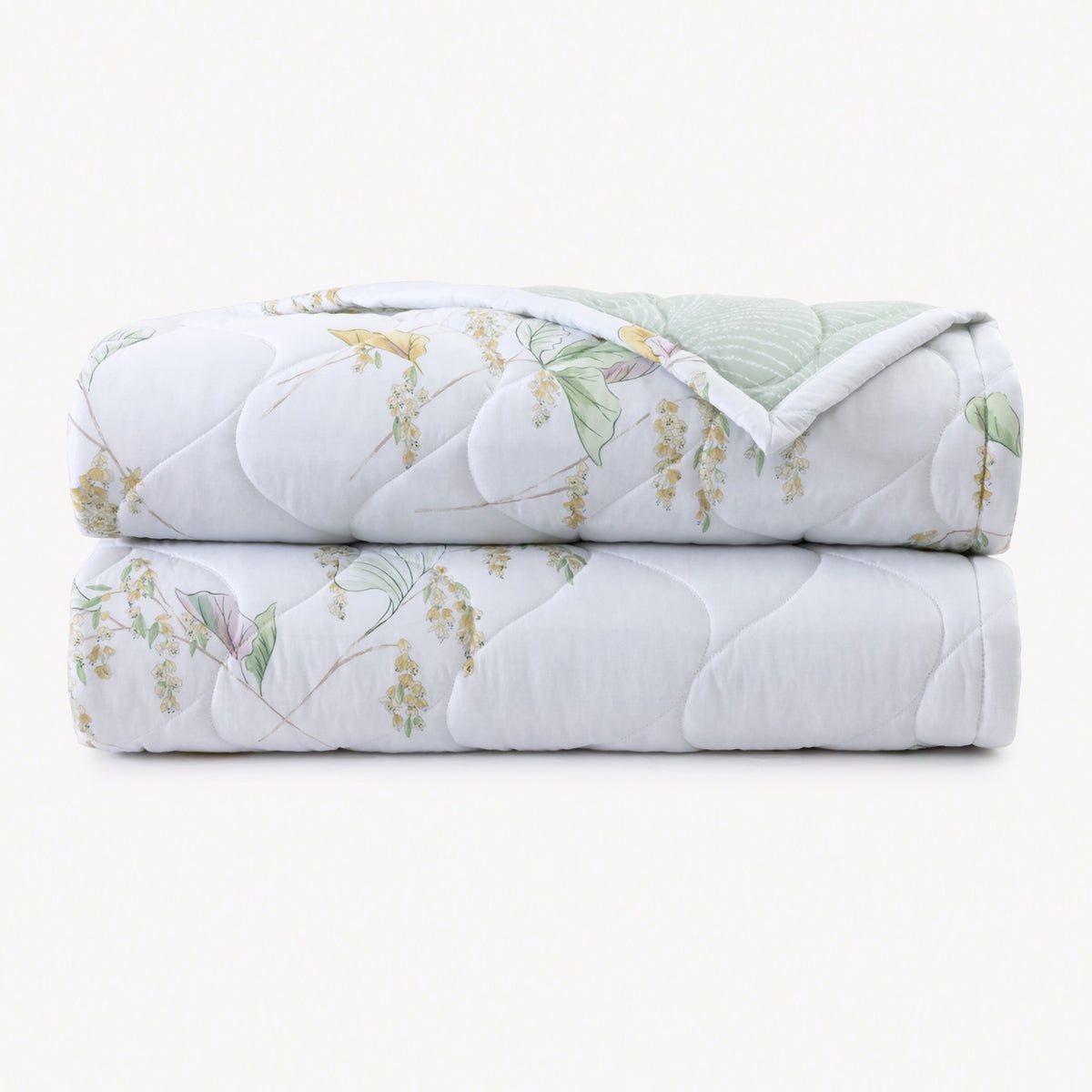 Folded Quilted Coverlet of Yves Delorme Pollen Bedding