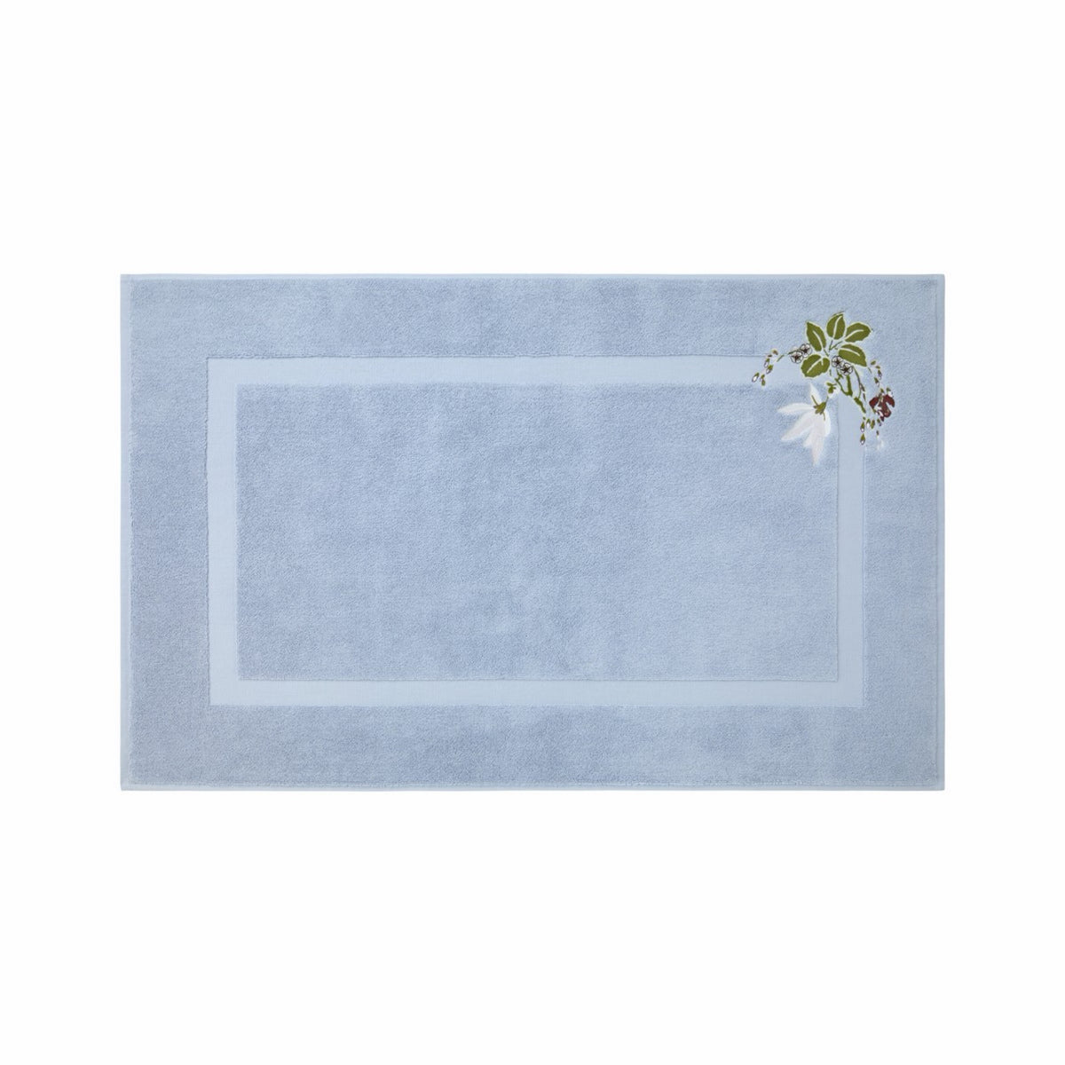 Light blue rectangular bath mat with a subtle border and an embroidered floral bath towels-inspired corner design.