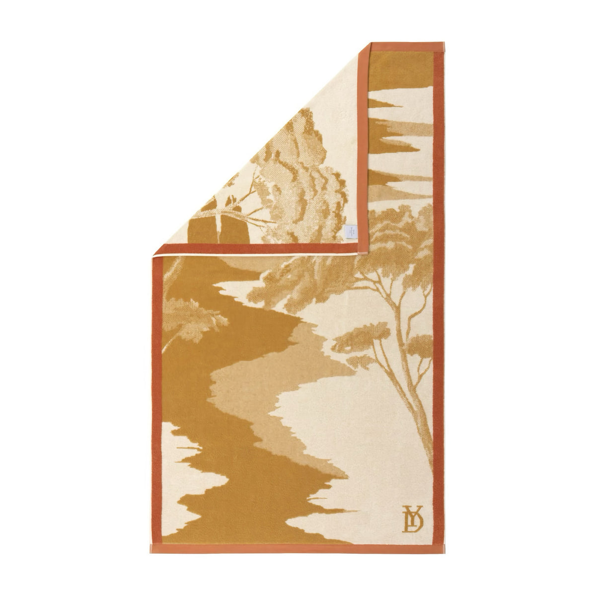 Yves Delorme Rive Beach Towel in Sable color with corner fold