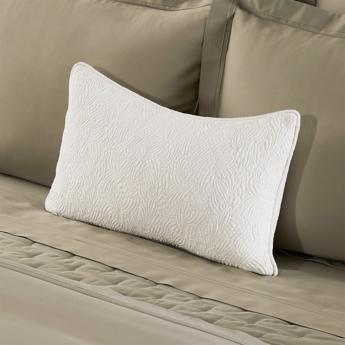 Yves Delorme Santoli Decorative Pillow in Nacre color with coordinate bedding