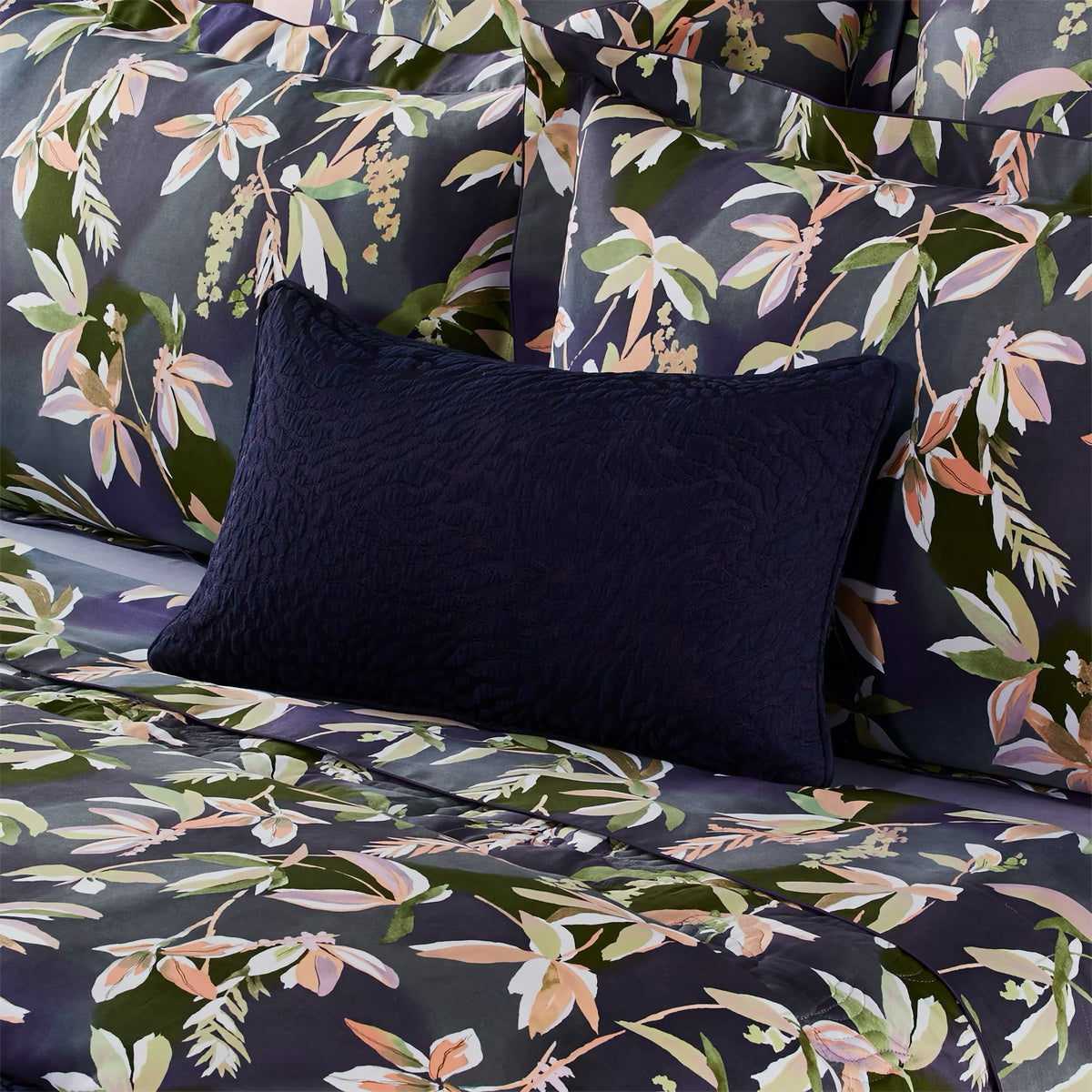 Yves Delorme Souvenir Coverlet and Decorative Pillow in Encre with coordinate bed