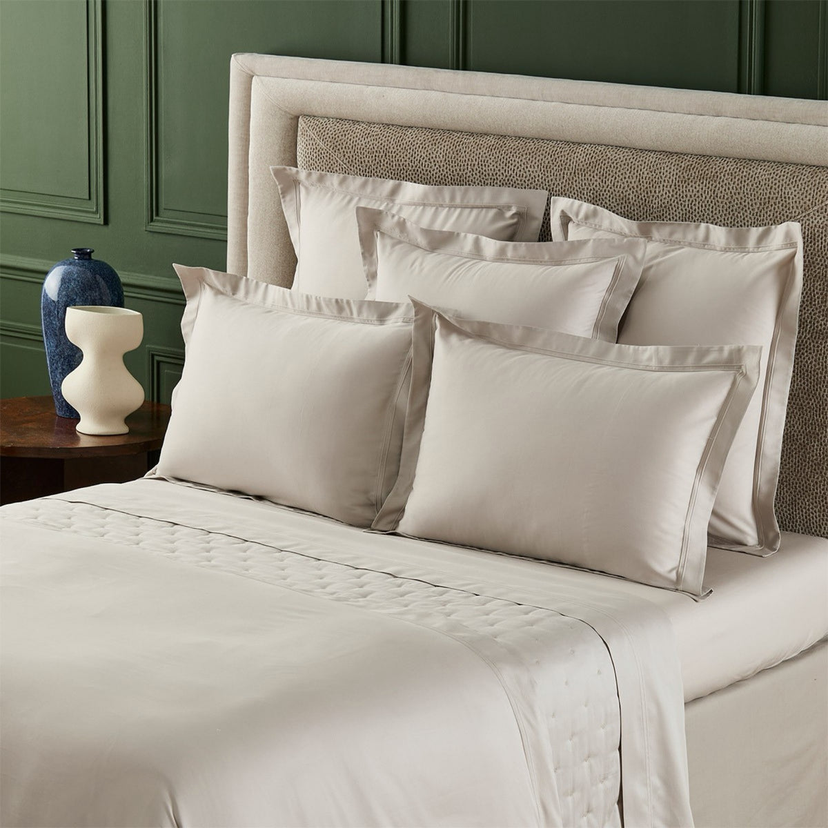 Corner View is Bed with Yves Delorme Triomphe Bedding in Loutre color