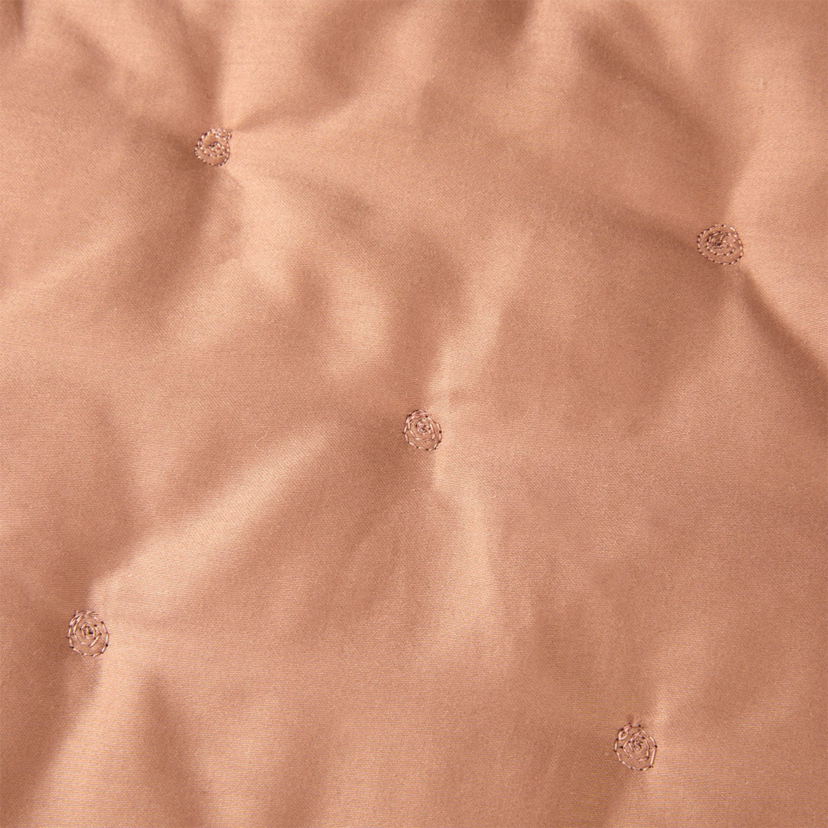 Closeup of Quilted Yves Delorme Triomphe Bedding Sienna Color