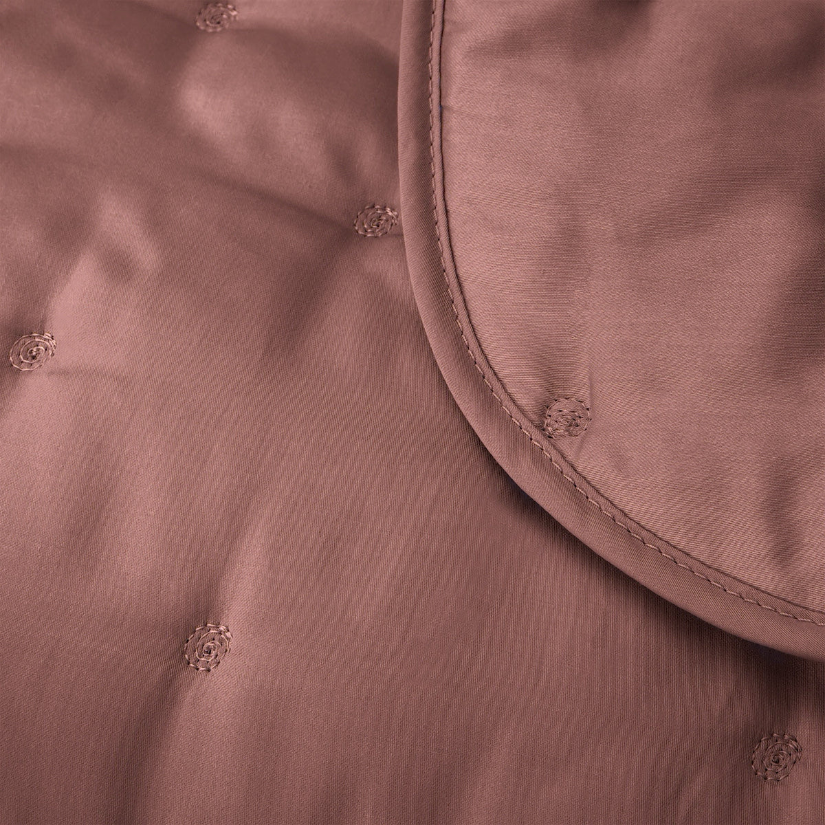 Fabric Closeup of Yves Delorme Triomphe Quilted Bedding in Santal