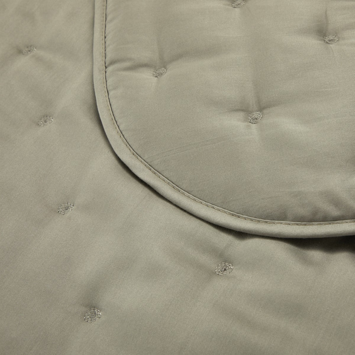 Closeup of Quilted Yves Delorme Triomphe Quilted Coverlet in Kaki