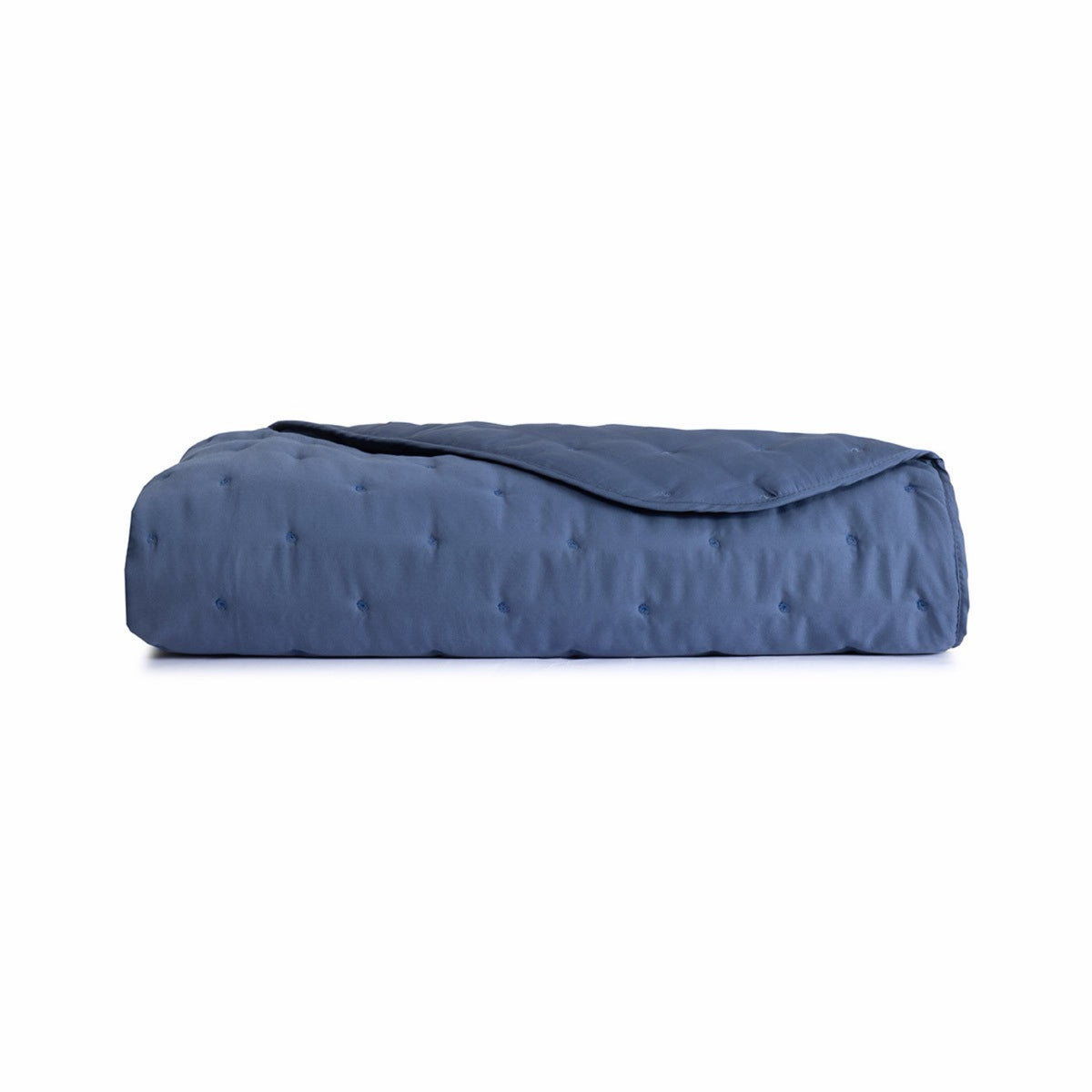 Folded Yves Delorme Triomphe Quilted Counterpane Sham in Outremer color