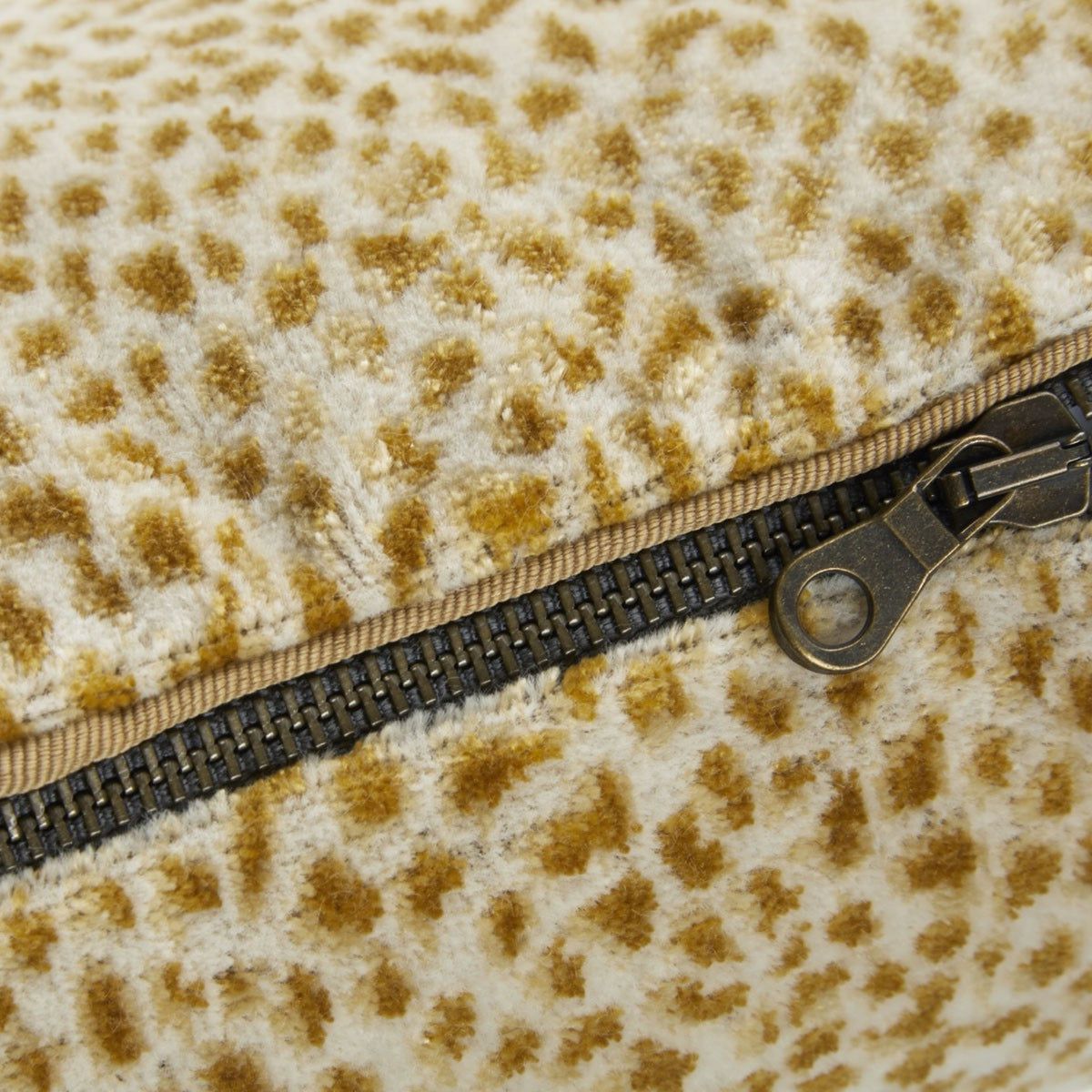 Zipper Closeup of Beige Yves Delorme Zenaide Decorative Pillows