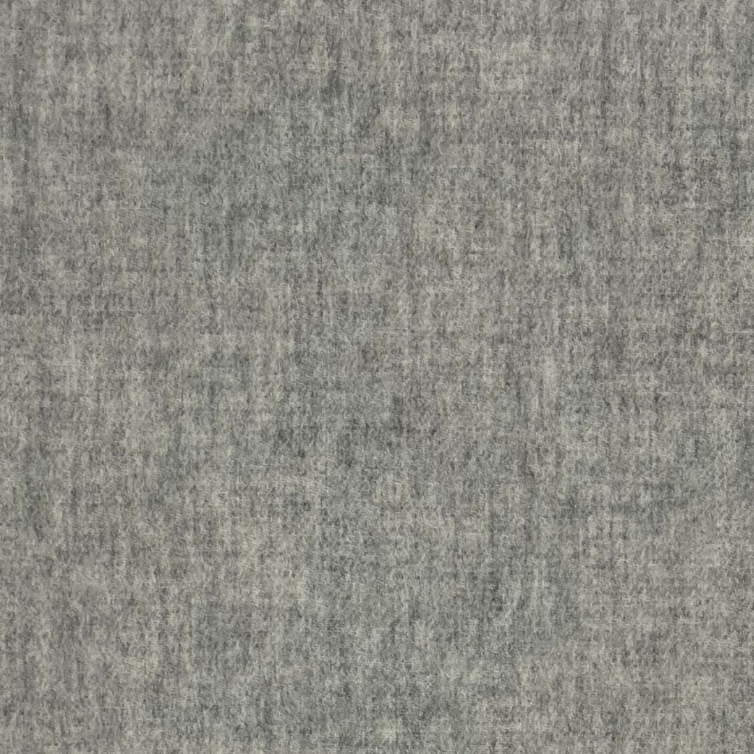 Gray textured fabric with a soft, felt-like appearance, ideal for plain weave throws and cozy woven blankets.