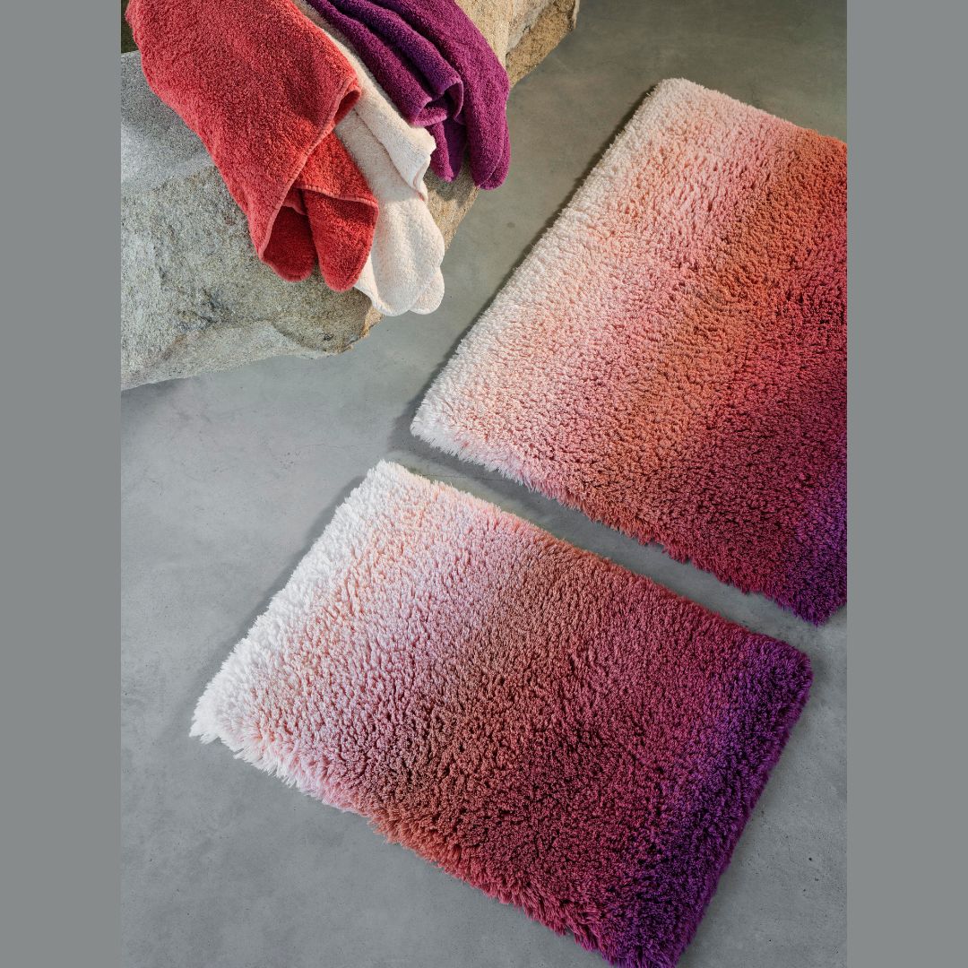 Aurore bath rugs side by side, small and large rugs