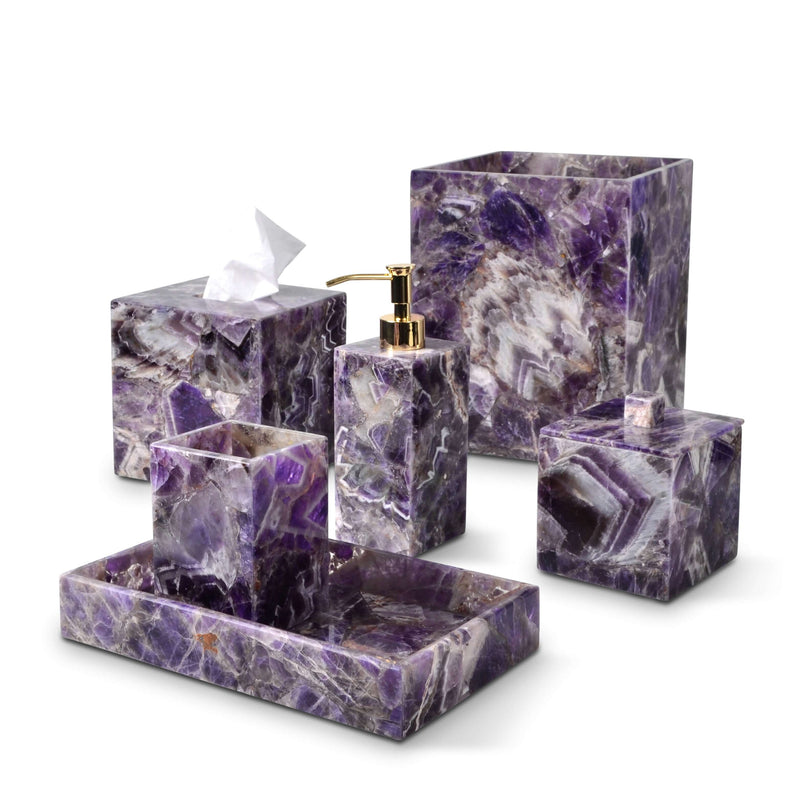A six-piece amethyst bath accessories set in purple marble, featuring a tissue box, soap dispenser, and tray.