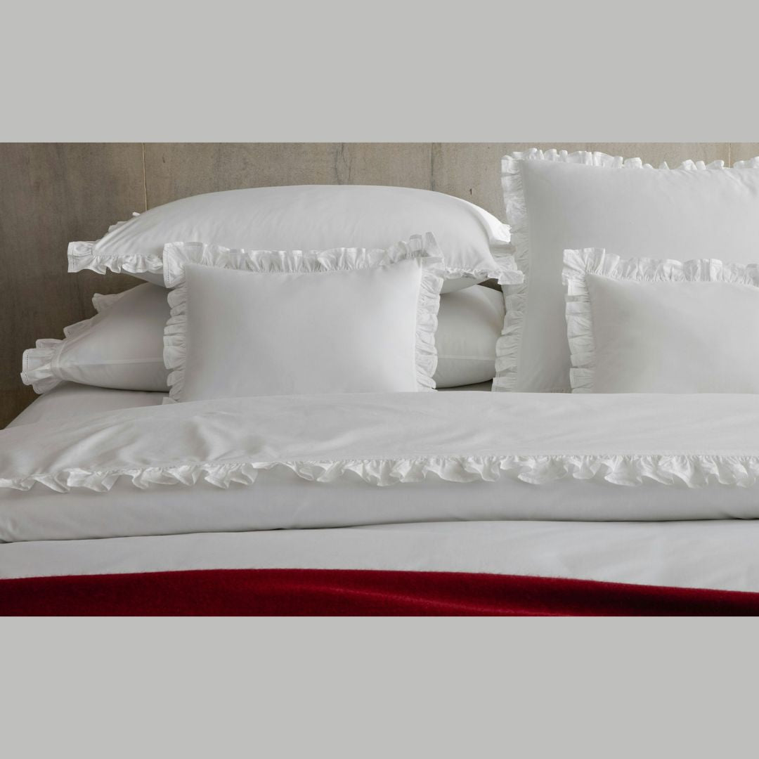 Matouk Georgia Bed sham and duvet cover close up with Paley Throw in Crimson