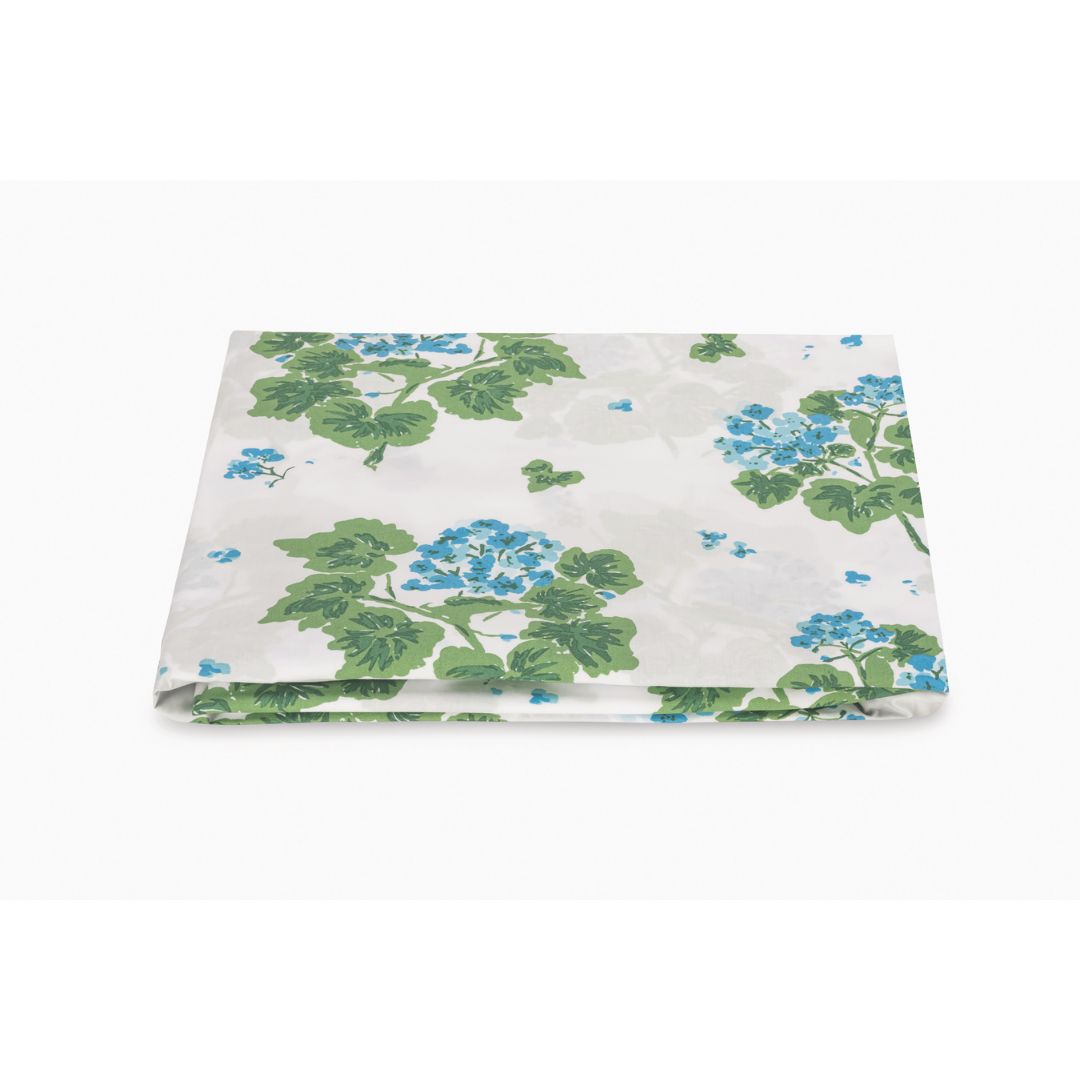 Floral patterned fitted sheet on a white background