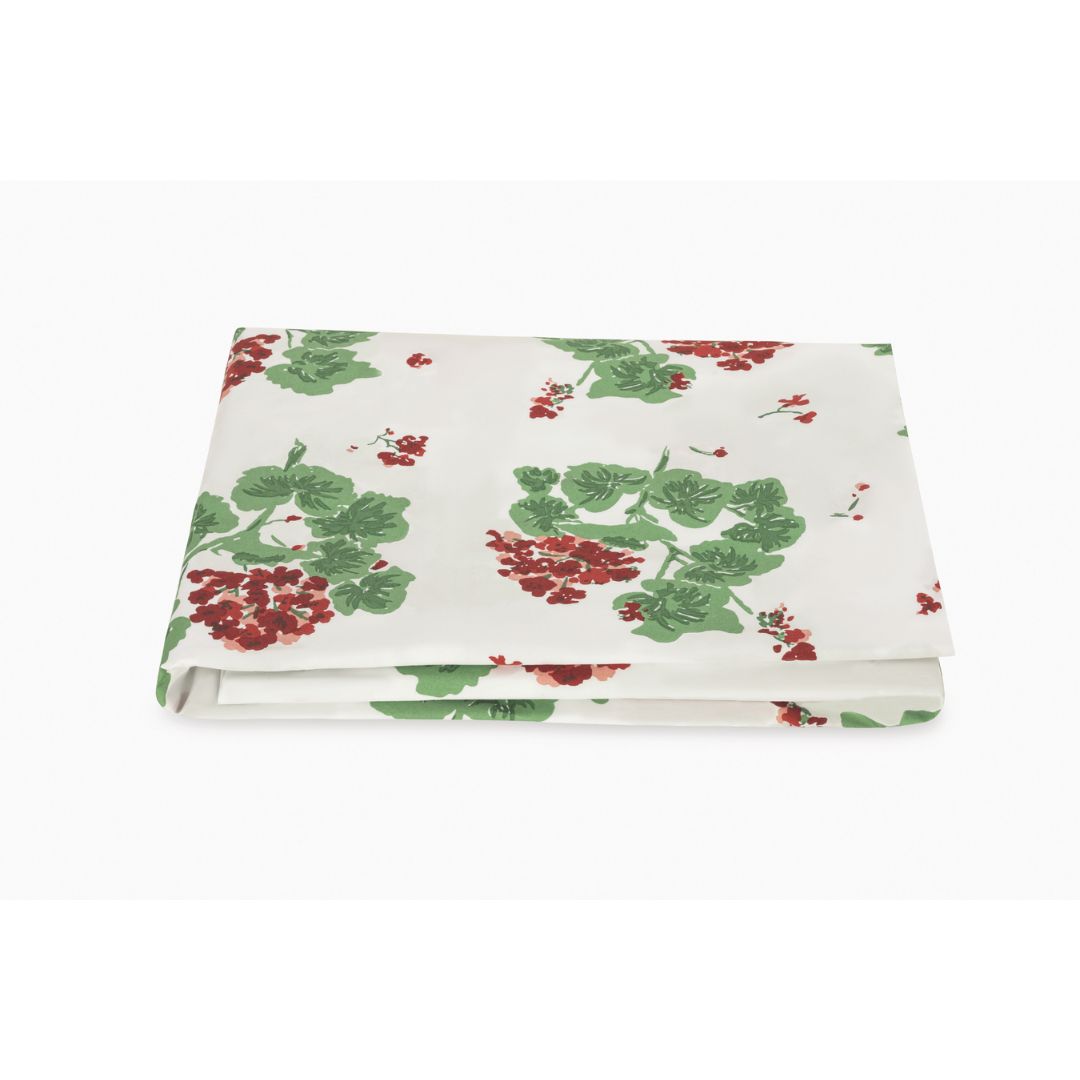 fitted sheet with red and green floral pattern on a white background