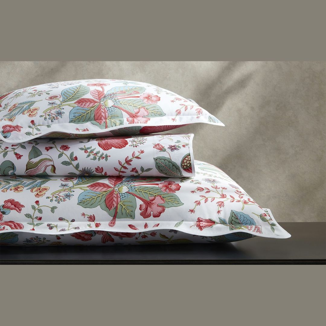 Floral patterned pillows on a neutral background