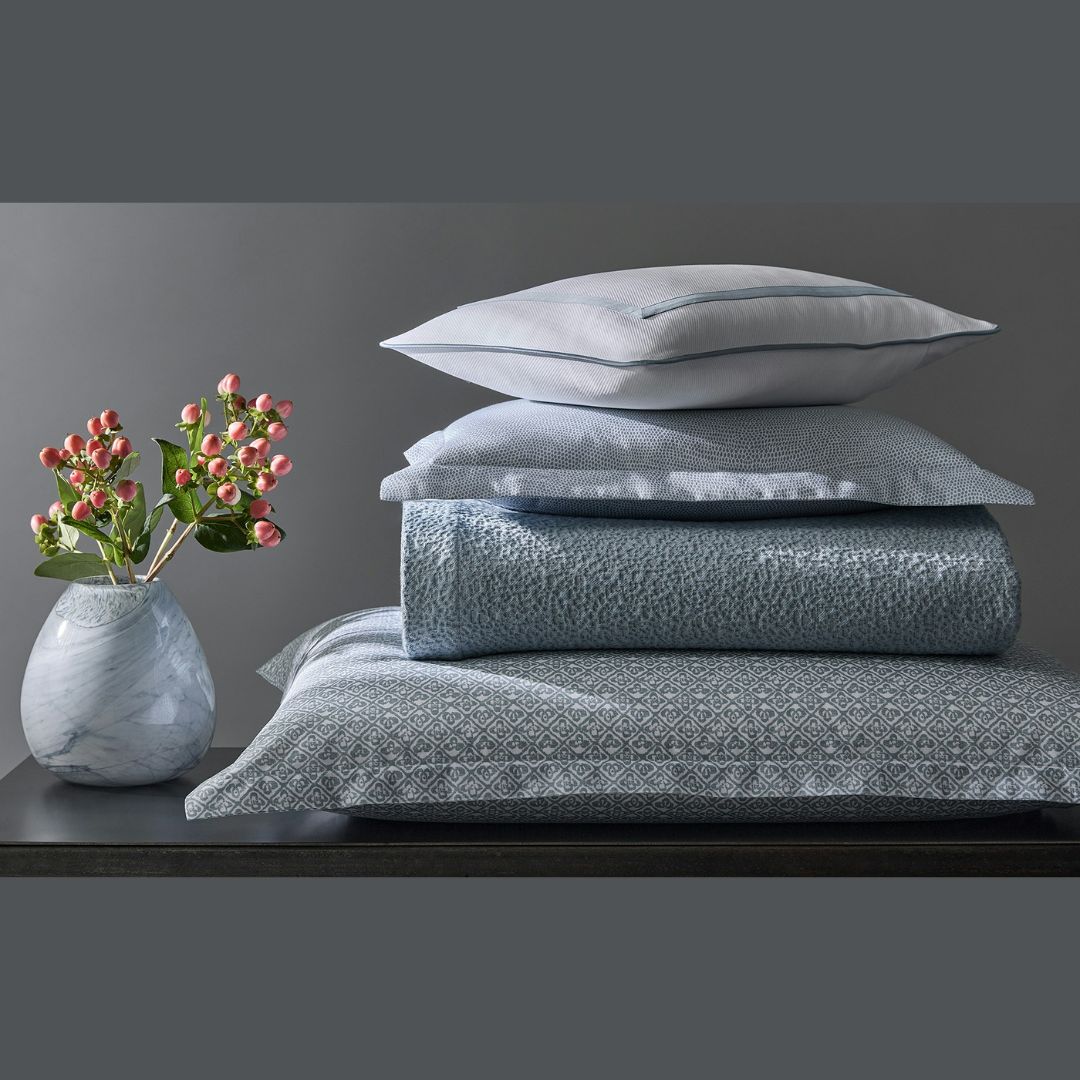 Malibu Coverlet in Hazy Blue. Shown with Louise Pique Coverlet in Hazy Blue, Jasper in Hazy Blue, and Catarina in Hazy Blue.