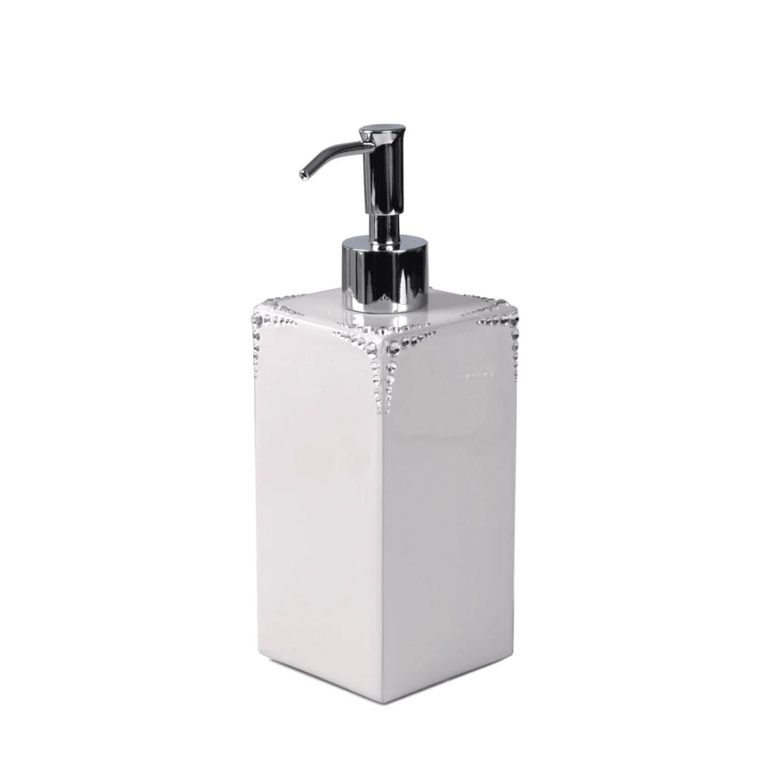 Pearl soap dispenser with silver trim on a white background