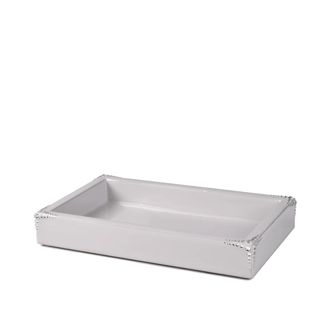 Silver decorative tray with embellished trim on a white background