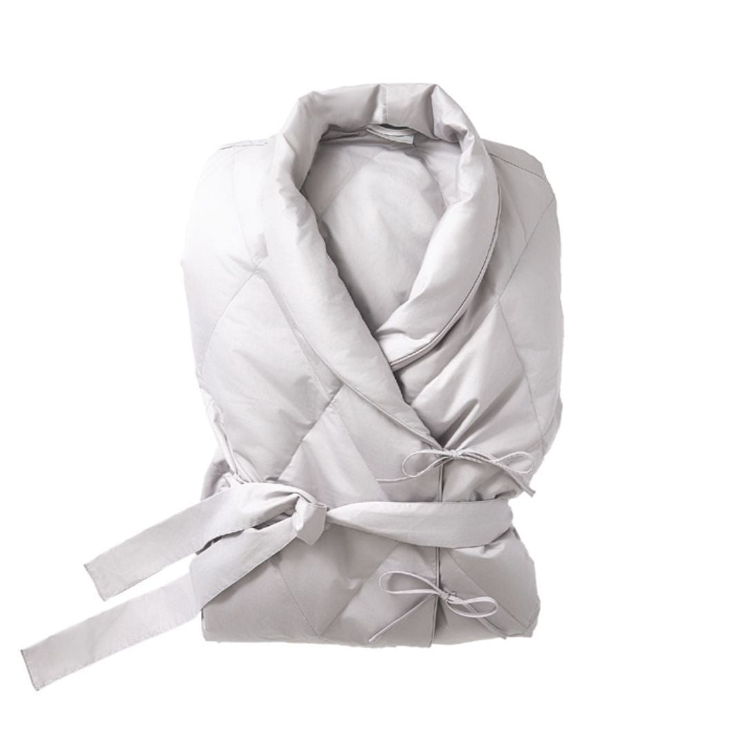 A light gray Scandia Home down robe with a shawl collar and fabric sash belt, neatly folded against a white background.