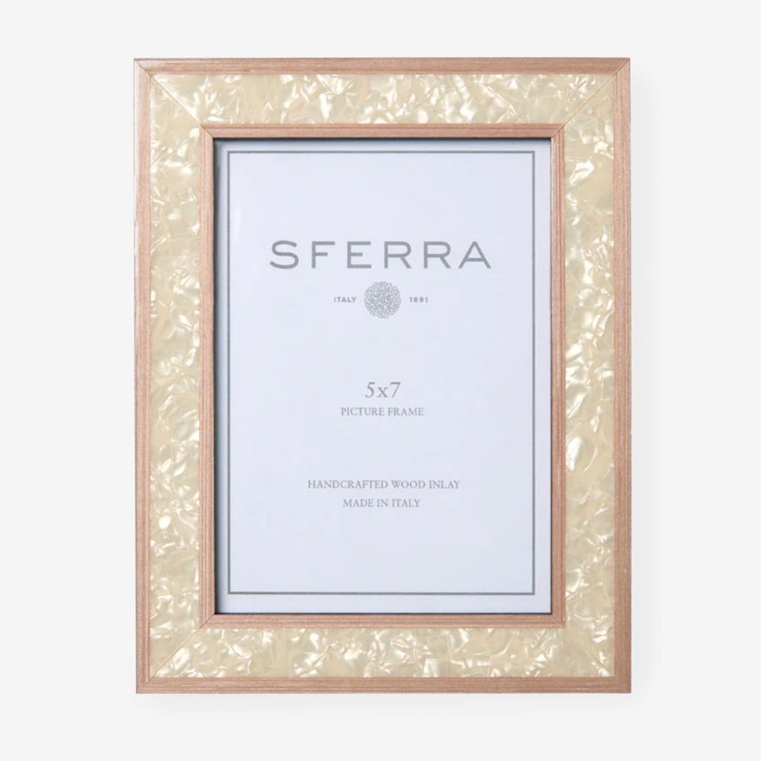 A 5x7 handcrafted Italian photo frame with a shiny, cream inlay and wooden edges, displaying the SFERRA brand insert.