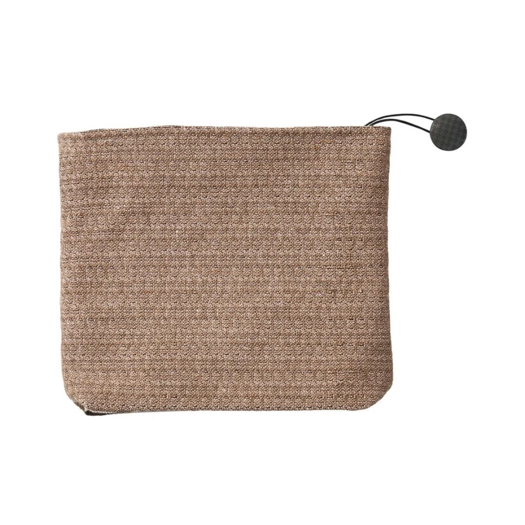 A small, rectangular, light brown cotton jacquard tapestry zippered pouch.