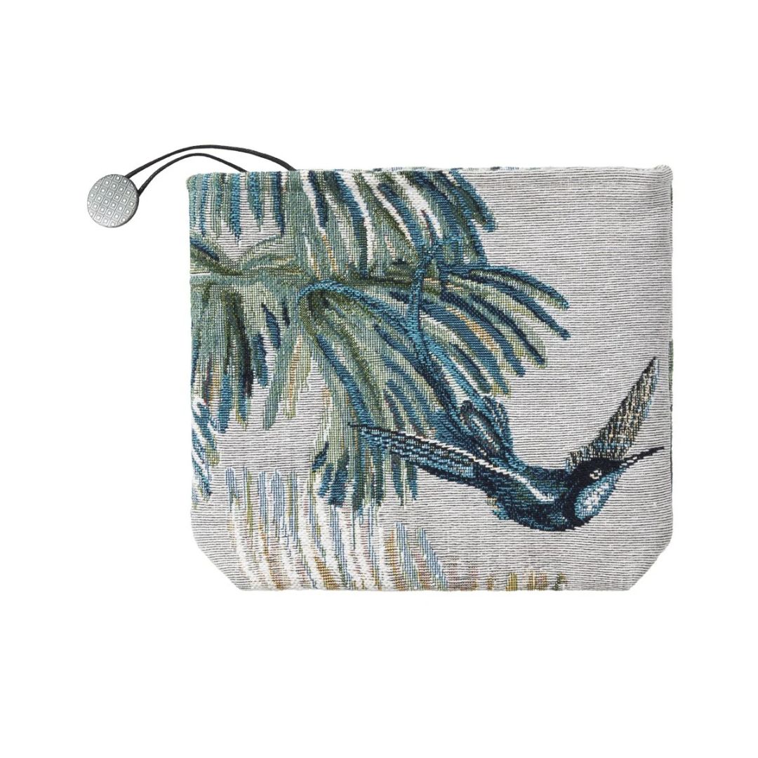 A square cotton jacquard tapestry pouch featuring a woven design of a hummingbird and tropical leaves.