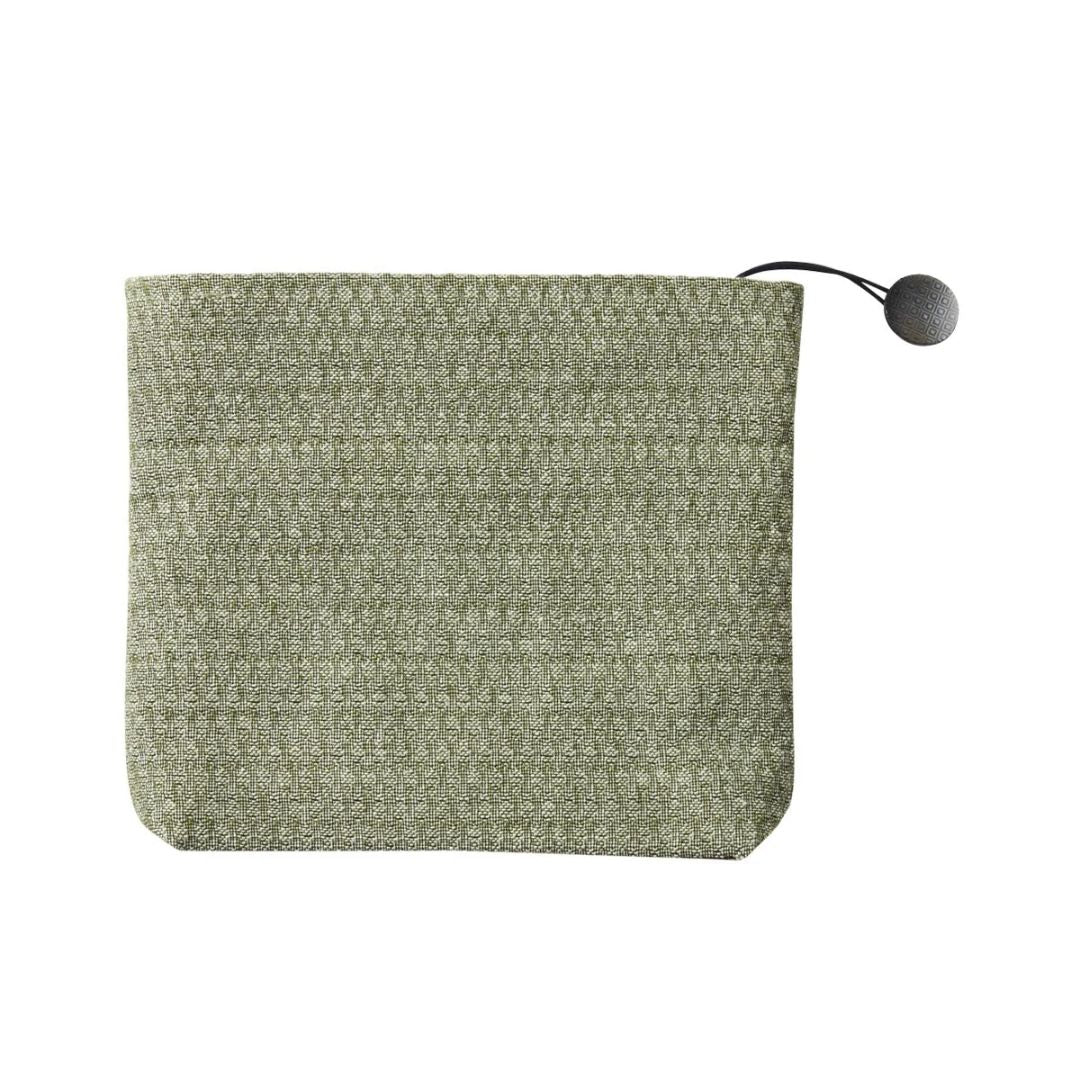 A green, rectangular cotton jacquard tapestry pouch with a drawstring closure.