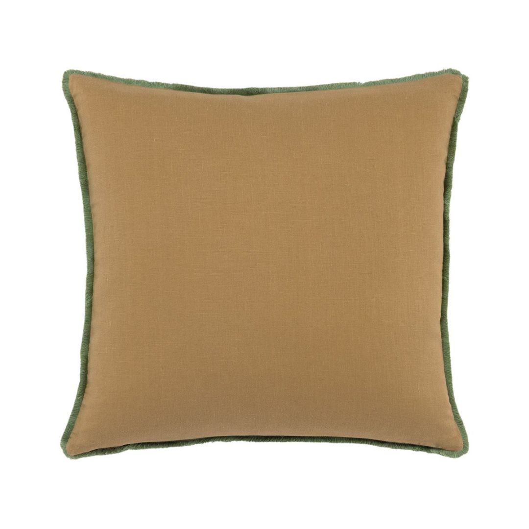 Square tan Yves Delorme decorative pillow with green fringe trim.