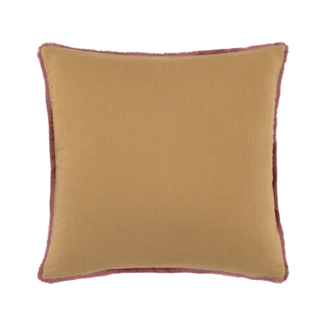 Square tan Yves Delorme cotton jacquard pillow with a mauve fringed edge.