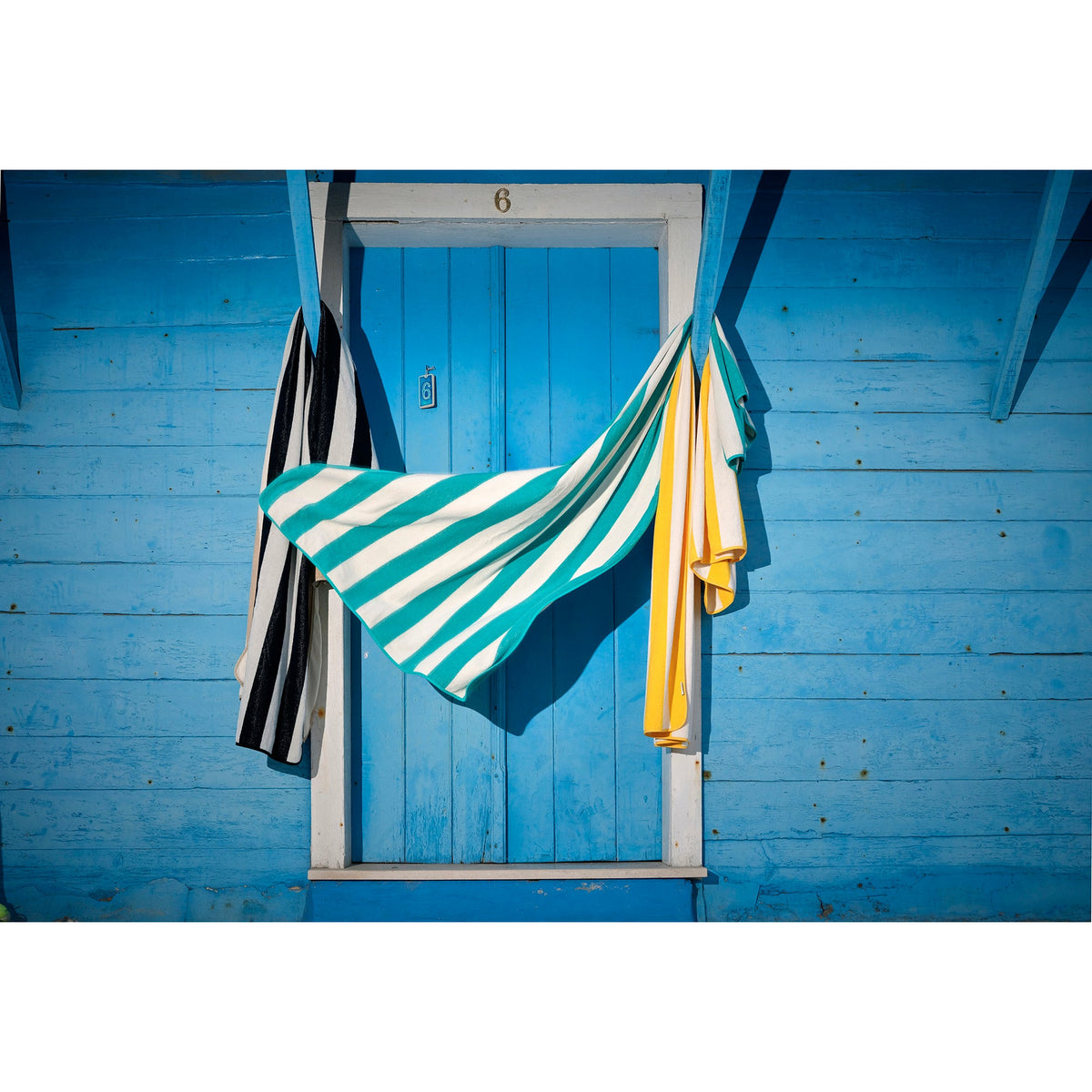 Abyss Prado Beach Towels Hanging Blue Wall 3 Fine Linens