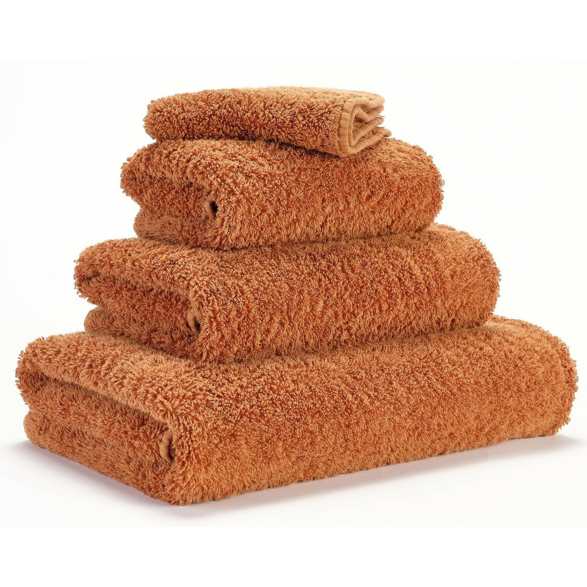 Abyss Super Pile Bath Towels Caramel Fine Linens Stack Slanted