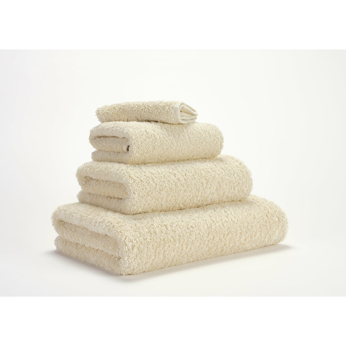 Abyss Super Pile Bath Towels Ecru Fine Linens Stack Slanted