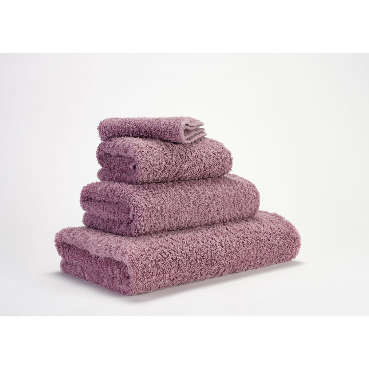 Abyss Super Pile Bath Towels Orchid Fine Linens Stack Slanted
