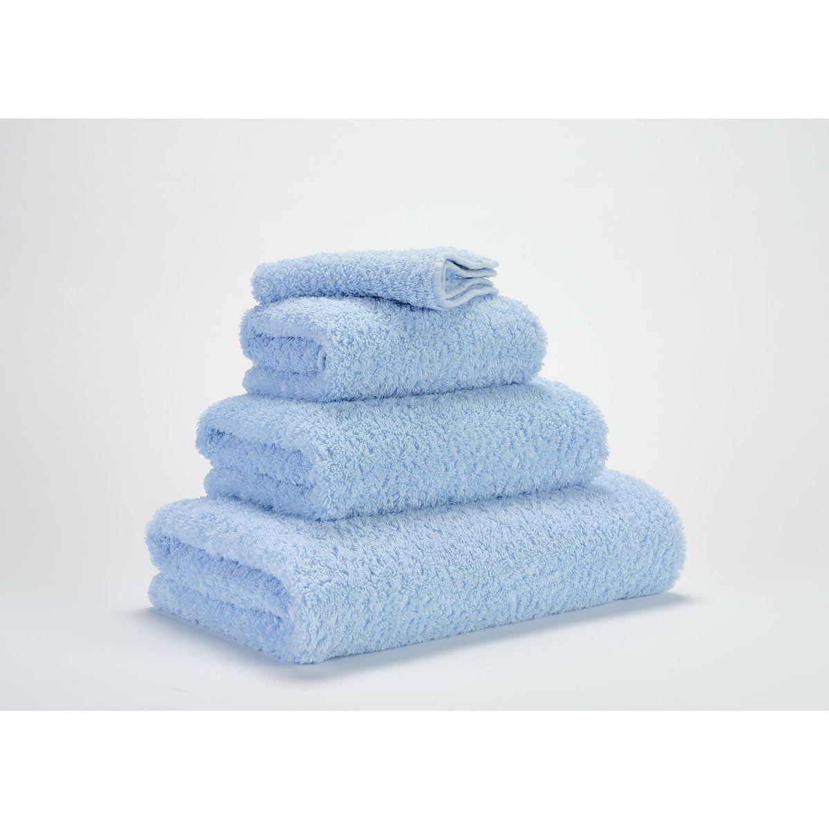 Abyss Super Pile Bath Towels Powder Blue Fine Linens Stack Slanted