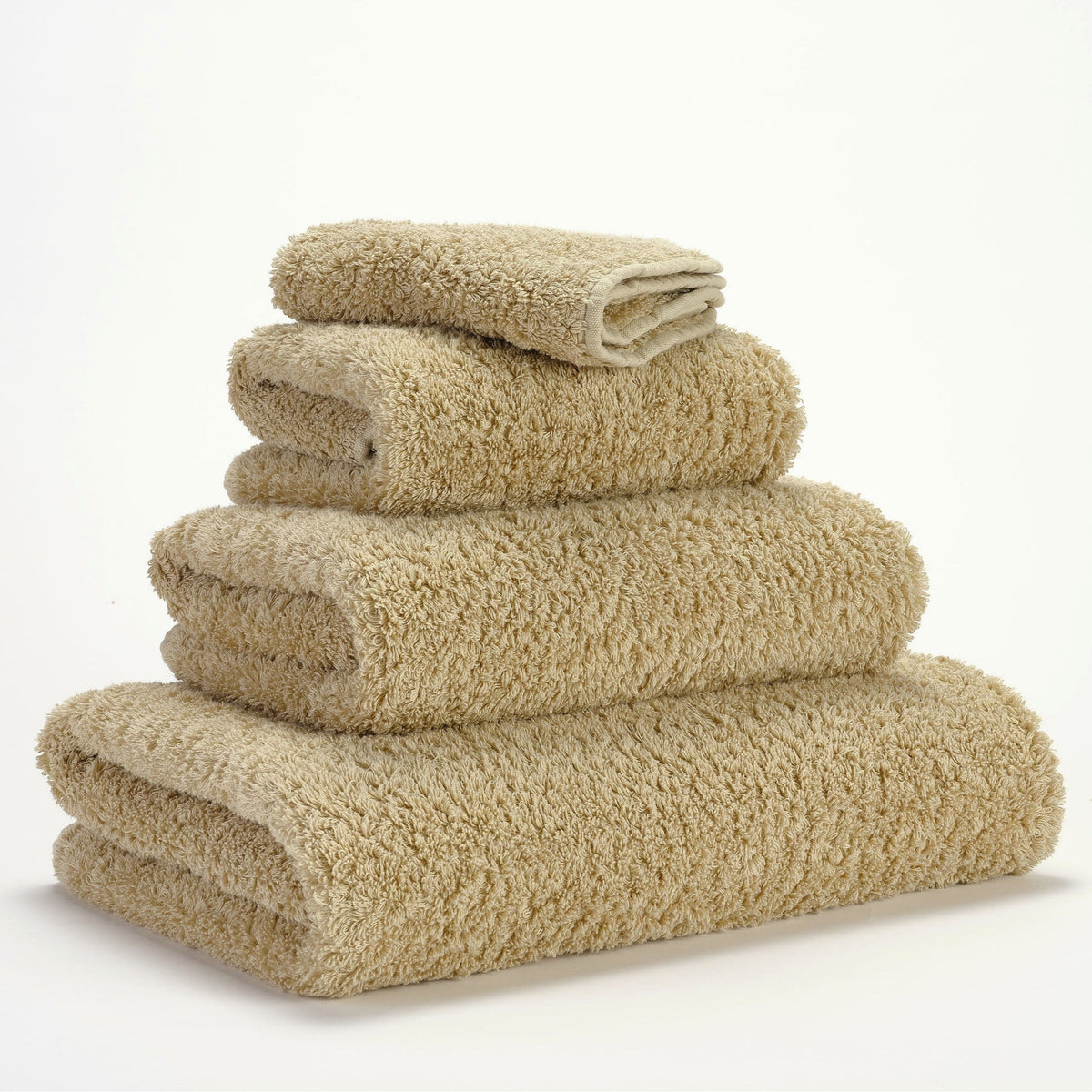 Abyss Super Pile Bath Towels Sand Fine Linens Stack Slanted