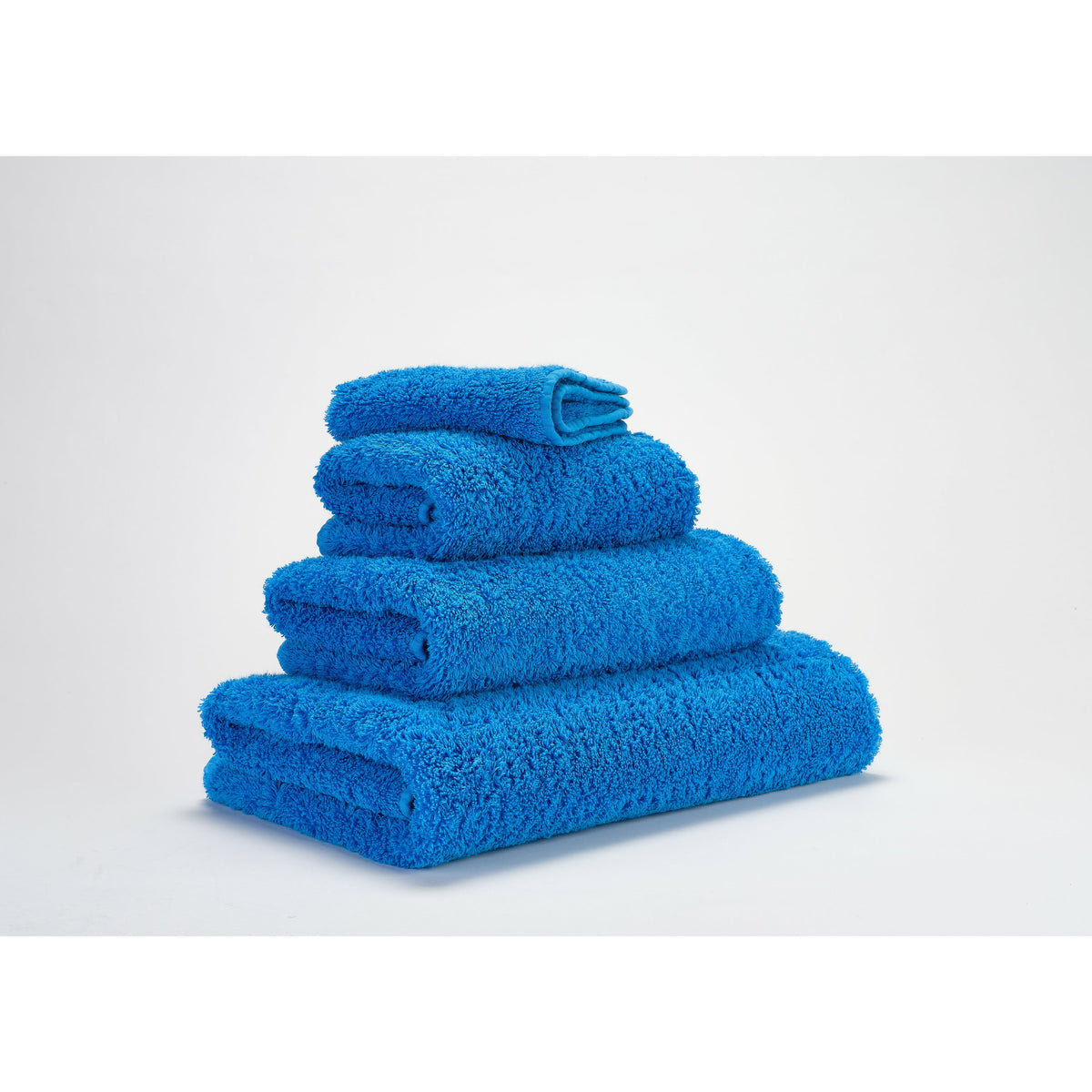 Abyss Super Pile Bath Towels Zanzibar Fine Linens Stack Slanted