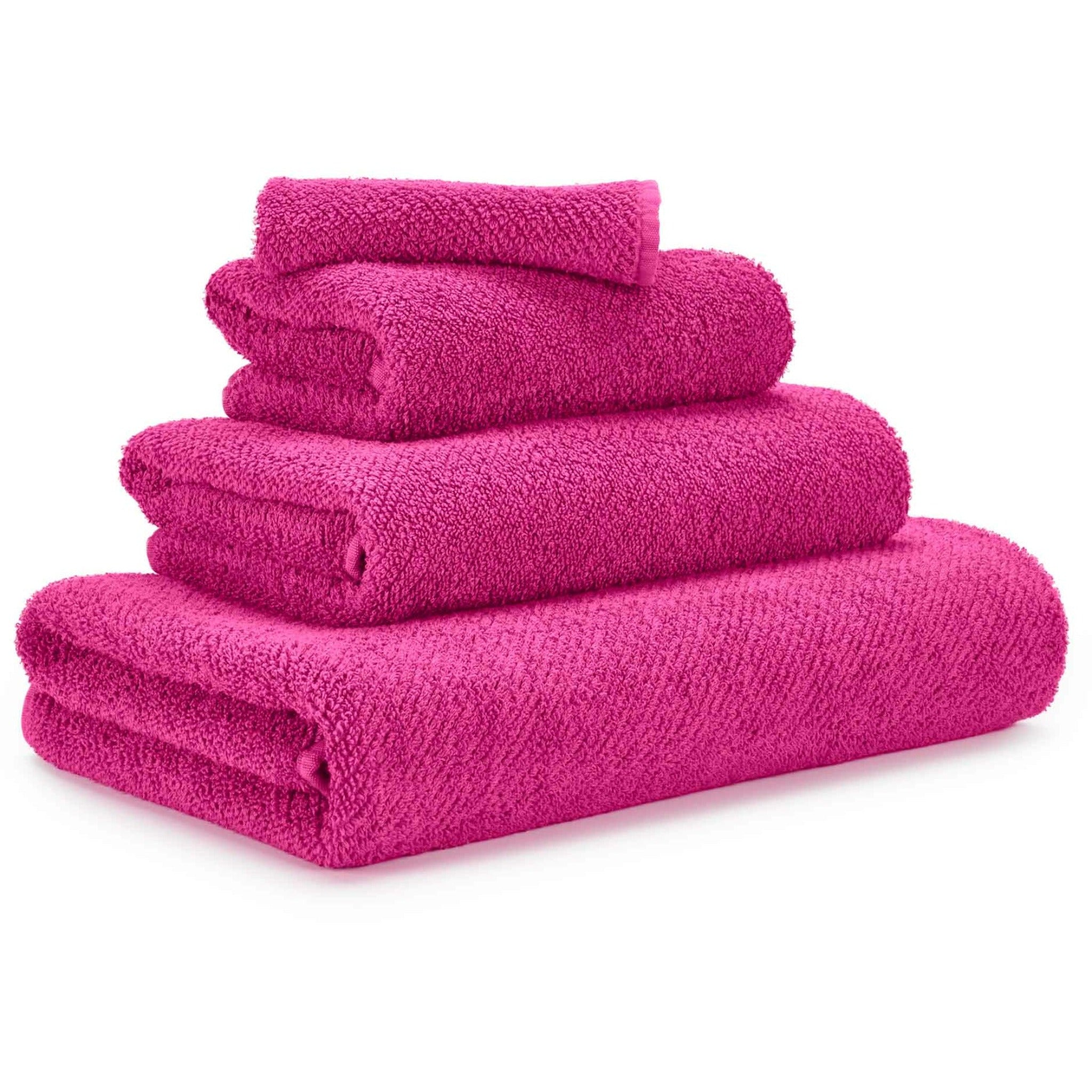 https://flandb.com/cdn/shop/products/Abyss-Twill-Towels-Stack-Happy-Pink_5000x.jpg?v=1666347154