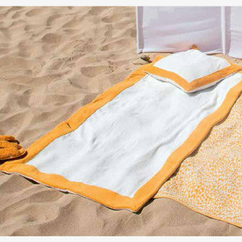 Abyss Habidecor Portofino Beach Towels and Pillows On Sand Safran (850) Fine Linens