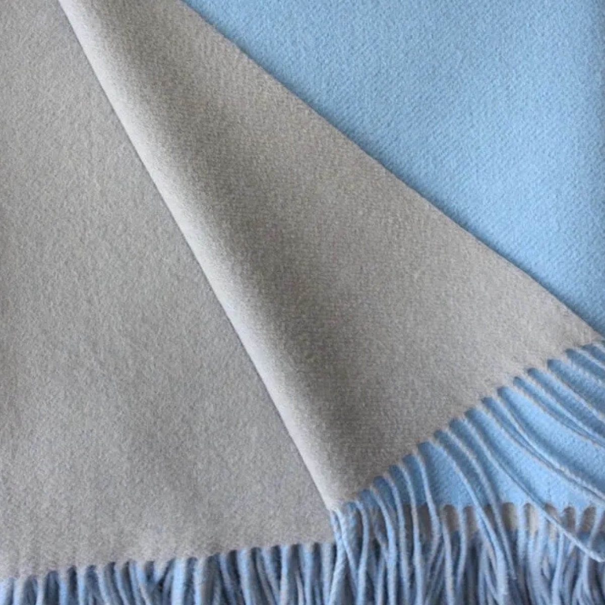 Fabric closeup of Alashan Double Faced Classic Cashmere Blend Throw - Carolina Blue/Platinum color