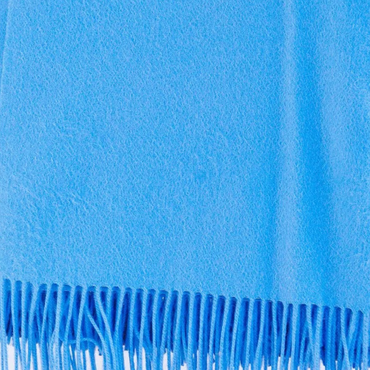 Closeup of Alashan 100% Cashmere Plain Weave Essential Throw Carolina Blue Color