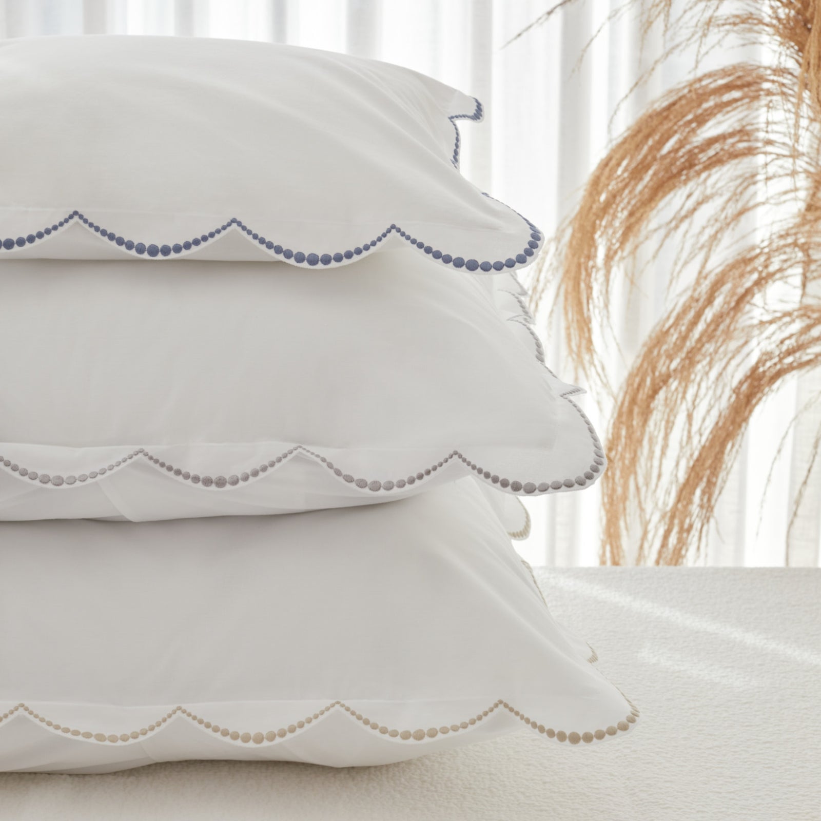 Stack of BOVI Nazare Bedding Shams in all colors