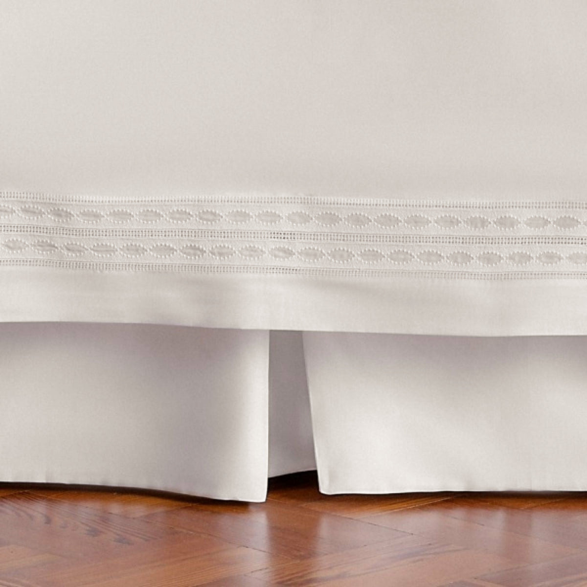 Closeup of BOVI Simply Sateen Bed Skirt - Ivory Color