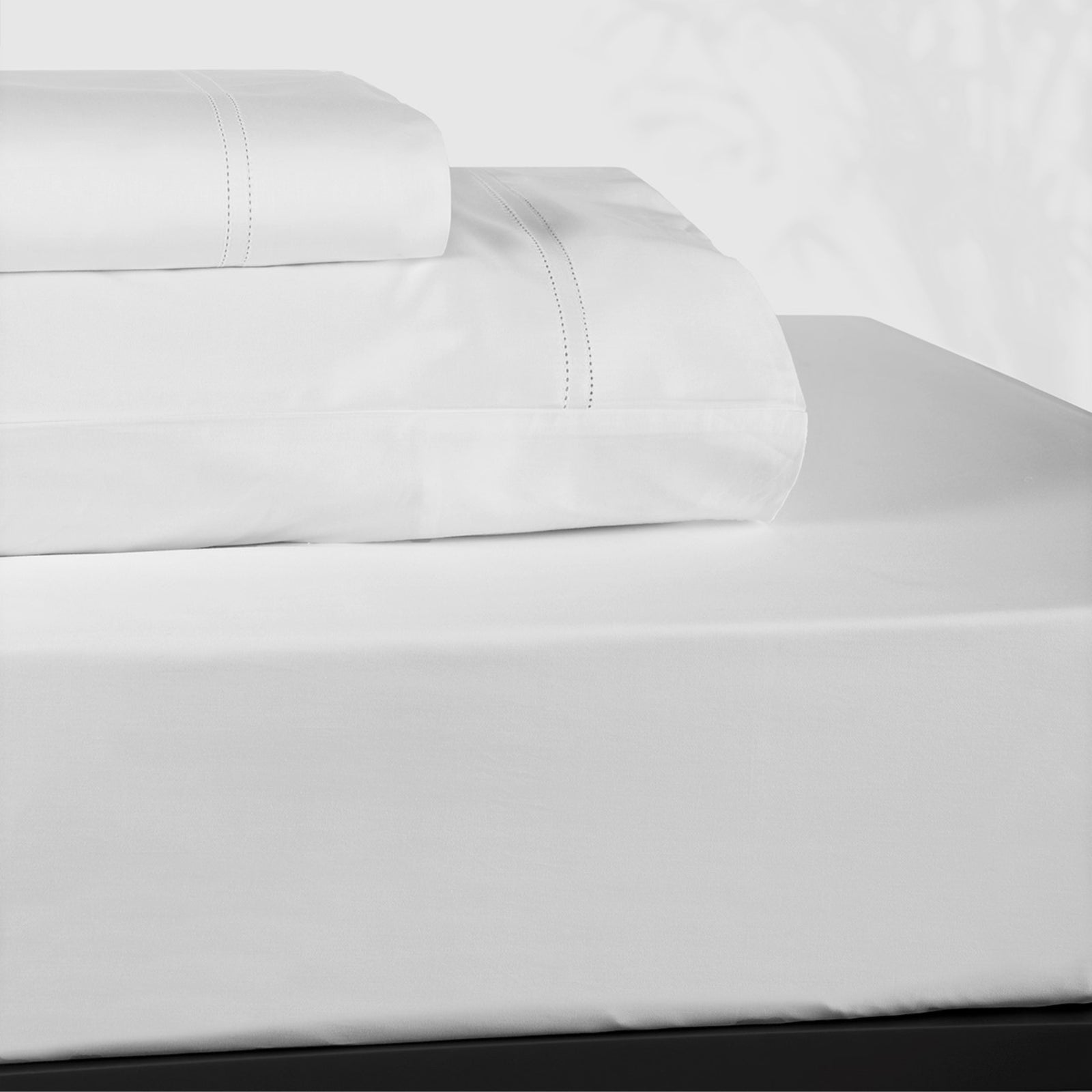 Stack of BOVI Simply Sateen Bedding Sheet Set White