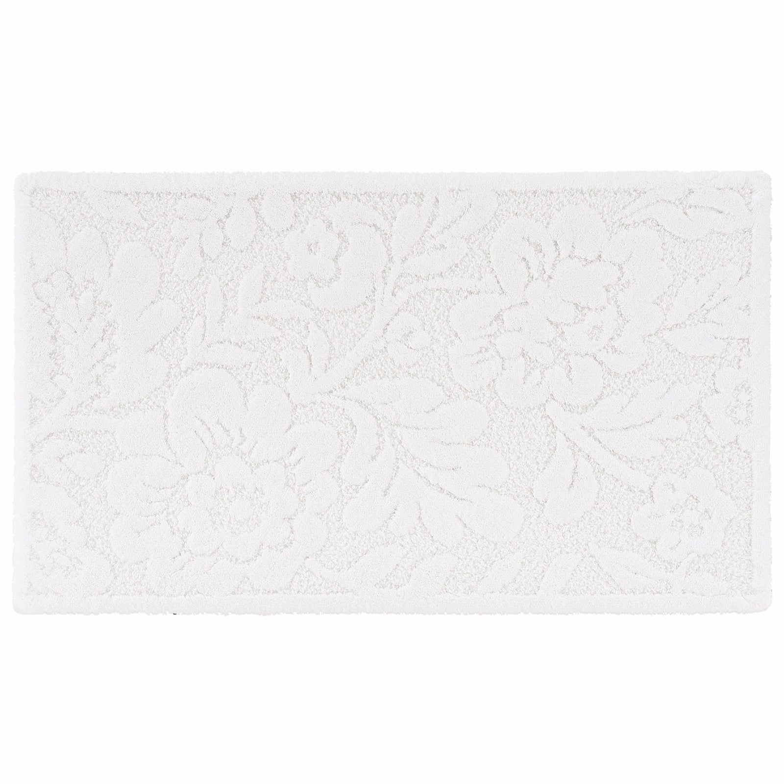 A white Abyss Habidecor Brighton bath rug with a subtle floral pattern.