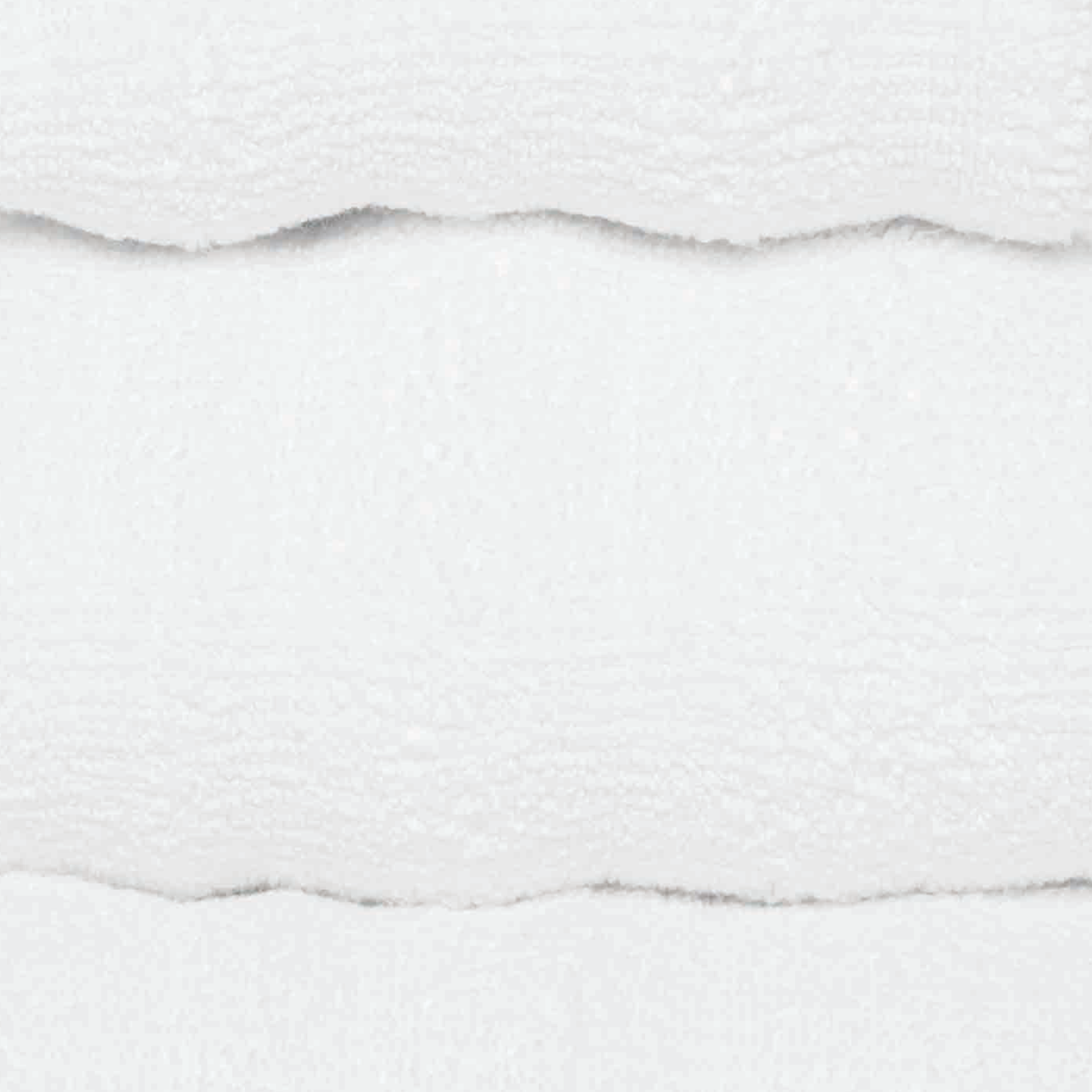 Stack of Graccioza Alentejo Bath Towels and Rug Collection in Bathroom