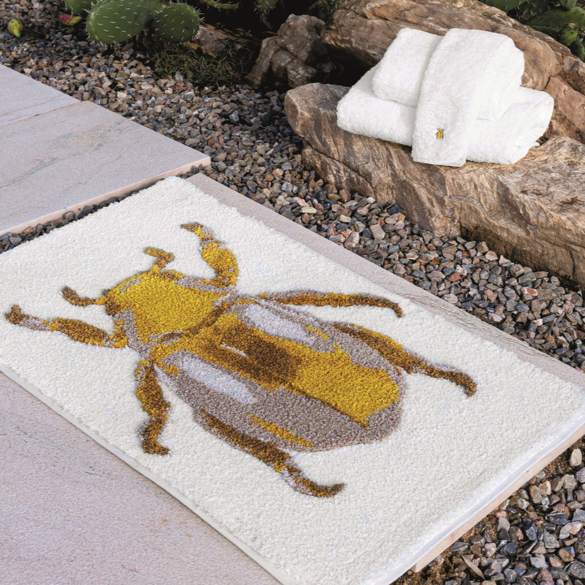 Lifestyle Image of Graccioza Beatle Bath Towels and Rugs