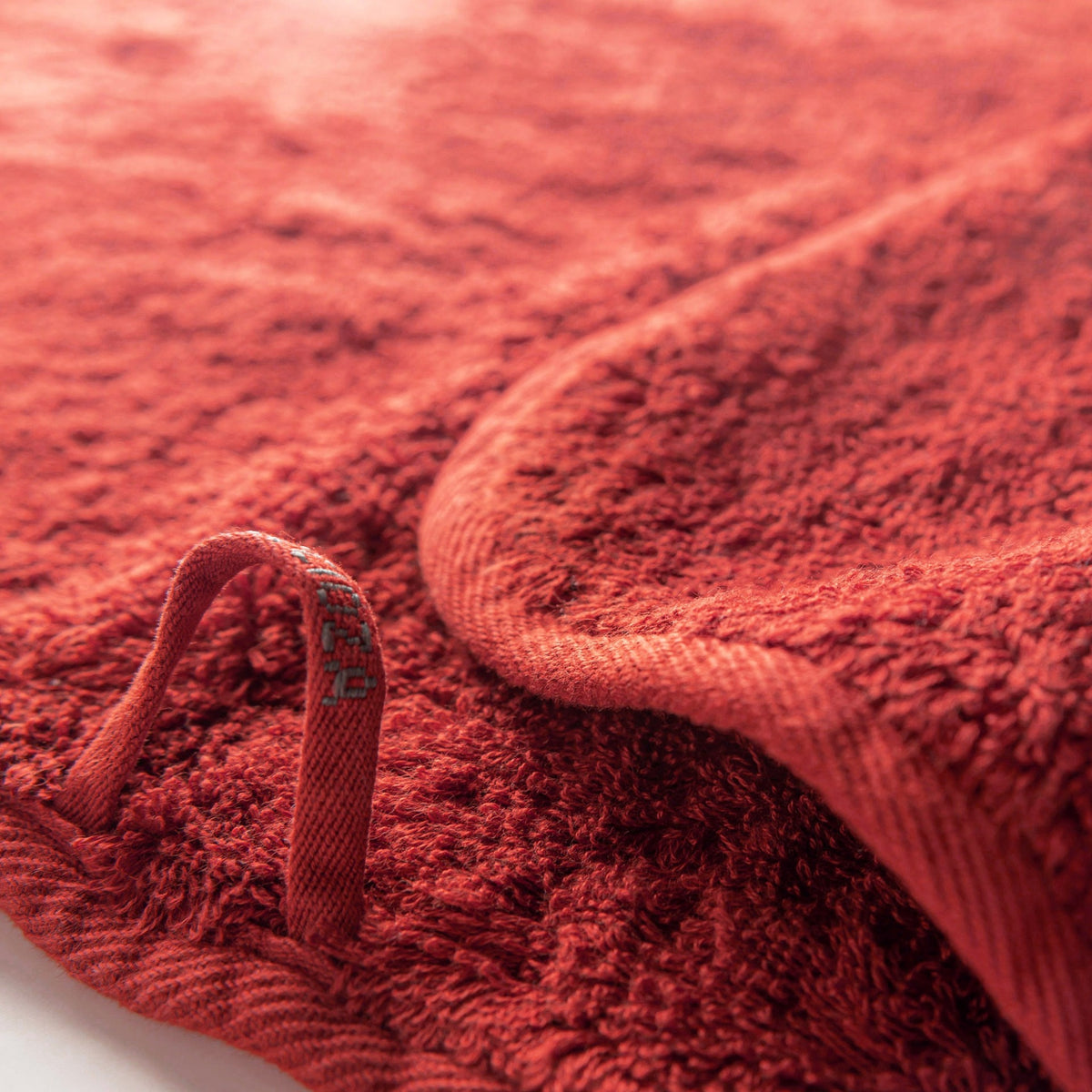 Clear Detail of Graccioza Egoist Bath Towels Cherry Color