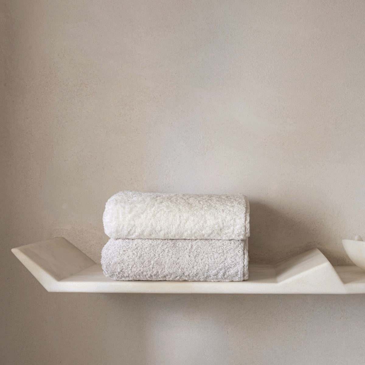 Folded Graccioza Grand Egoist Bath Towels in Lifestyle