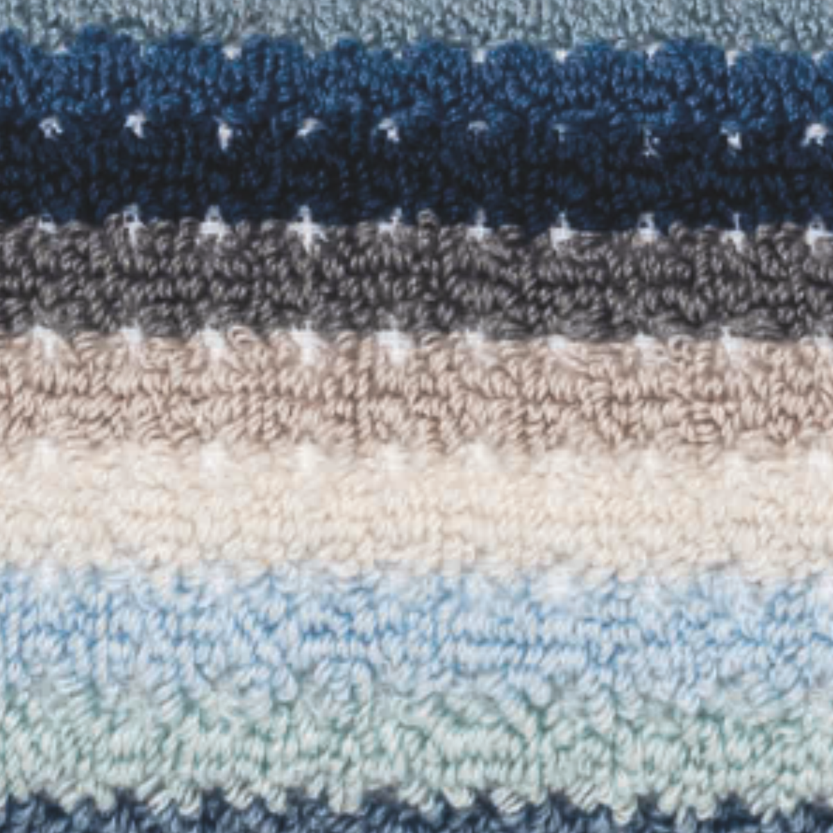Closeup of Fabric of Graccioza Lollypop Bath Towels in Color Blue